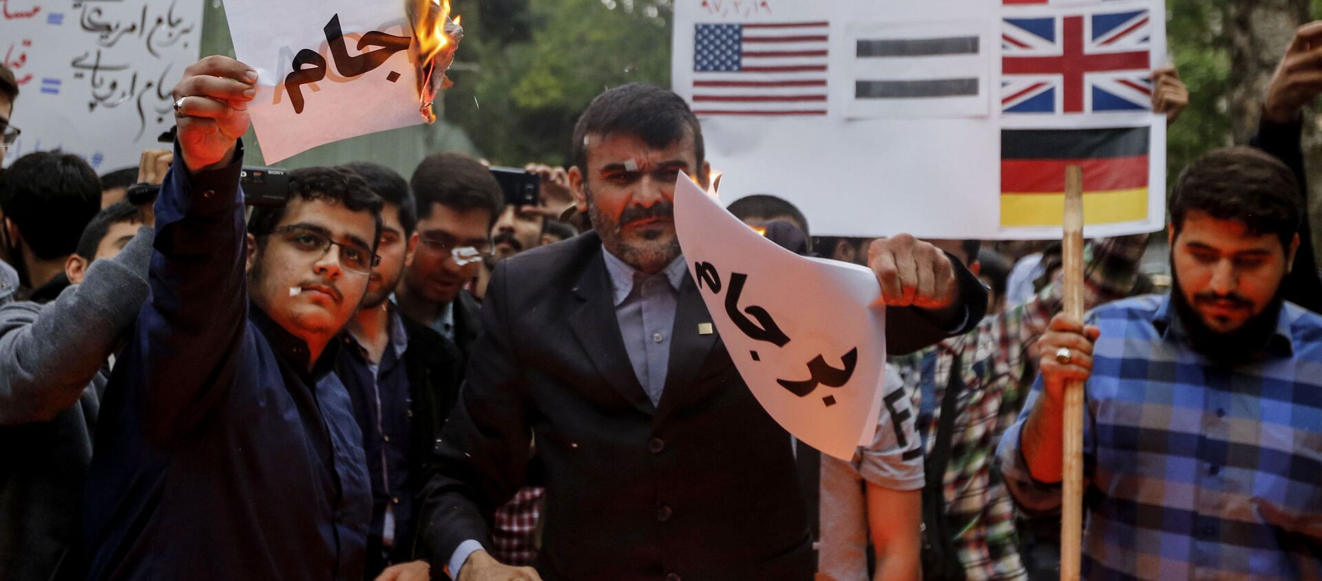 احتجاجات في طهران بعد خروج دونالد ترامب من صفقة الاتفاق النووي مع إيران، 9 مايو/ أيار 2018 - سبوتنيك عربي, 1920, 07.04.2021