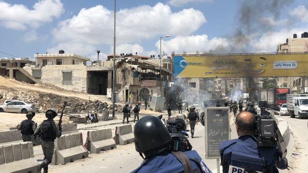  اشتباكات حاجز قلنديا، رام الله، الضفة الغربية، فلسطين 14 مايو/ أيار 2018 - سبوتنيك عربي