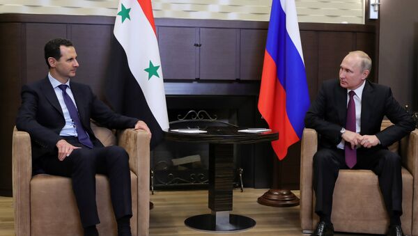 الرئيسان بوتين والأسد في لقاء سوتشي - سبوتنيك عربي