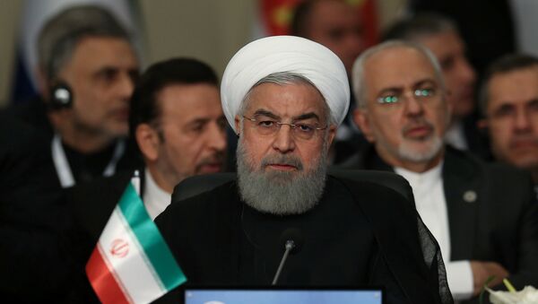 الرئيس الإيراني حسن روحاني في القمة العربية الإسلامية في تركيا، 18 مايو/أيار 2018 - سبوتنيك عربي