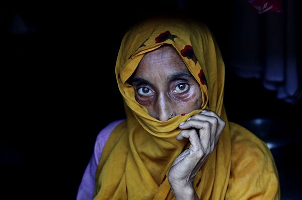 امرأة من لاجئي روهينغيا في معسكر كوتوبالونغ على الحدود بين ميانمار وبنغلاديش - سبوتنيك عربي
