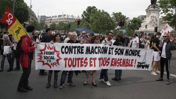 احتجاجات ضد الإصلاحات الاقتصادية للرئيس الفرنسي إيمانويل ماركون في باريس، فرنسا - سبوتنيك عربي
