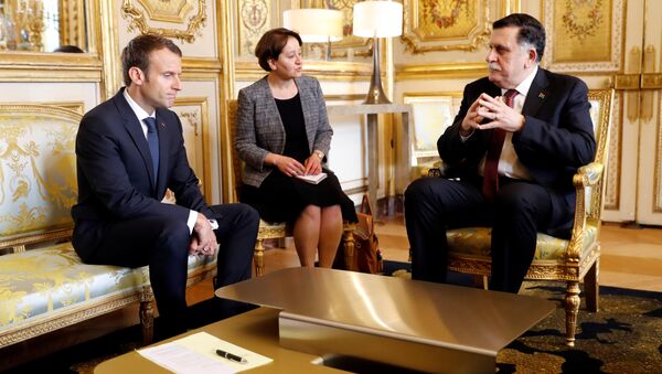 لقاء بين فايز السراح والرئيس الفرنسي إيمانويل ماكرون في باريس - سبوتنيك عربي