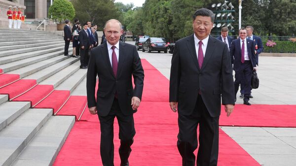  الرئيس الروسي فلاديمير بوتين والرئيس الصيني شى جين بينغ خلال اللقاء في الصين - سبوتنيك عربي