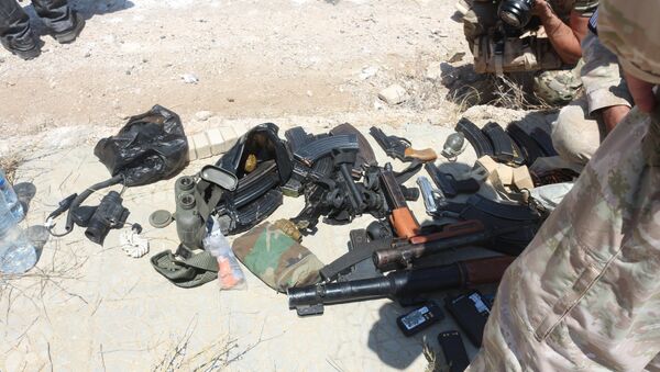 أسلحة المسلحين الذي يخرجون من درعا إلى الشمال السوري - سبوتنيك عربي