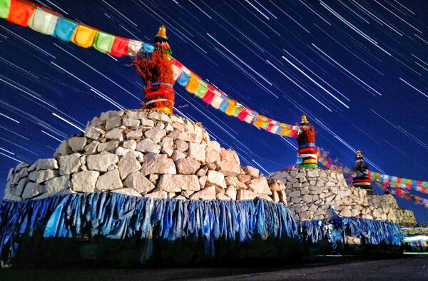 صورة بعنوان Stars over Sacred Mongolian Ovoo للمصور كيكيجي جاو - سبوتنيك عربي