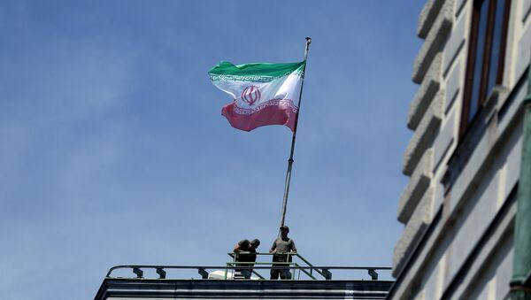 العلم الإيراني فوق المستشارية النمساوية خلال زيارة روحاني - سبوتنيك عربي