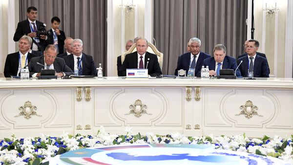 الرئيس الروسي خلال اجتماع قمة بحر قزوين - سبوتنيك عربي