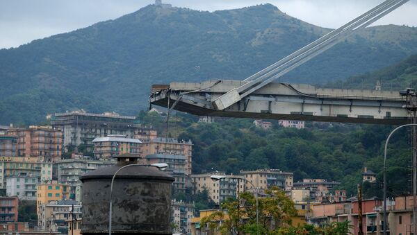 انهيار جسر في جنوة، إيطاليا 14 أغسطس/ آب 2018 - سبوتنيك عربي