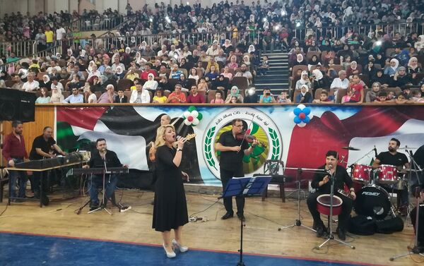 مساعدات أنغوشية لألف عائلة حلبية وغناء من الفلكلور السوري - سبوتنيك عربي