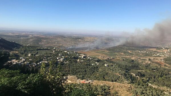 انفجار بمقر للمسلحين التركستان جنوب شرقي إدلب - سبوتنيك عربي