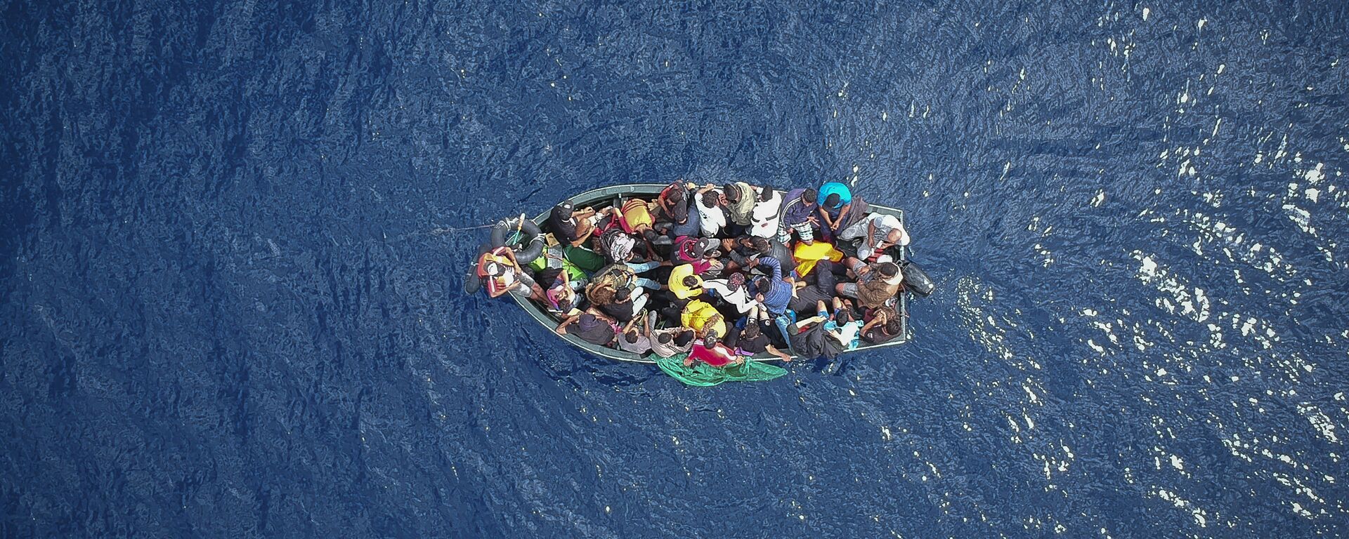 قارب يحمل مهاجرين في مضيق جبل طارق - سبوتنيك عربي, 1920, 15.12.2020