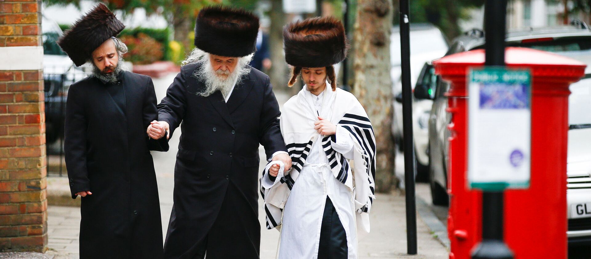 يهود الأرثوذكس في منطقة ستامفورد هيل في لندن خلال عطلة يوم كيبور (عيد الغفران)، 19 سبتمبر/ أيلول 2018 - سبوتنيك عربي, 1920, 18.12.2020