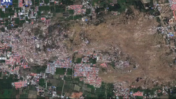 قمر صناعي يلتقط لحظة تدمير زلزال لمنطقتين في أندونيسيا  - سبوتنيك عربي