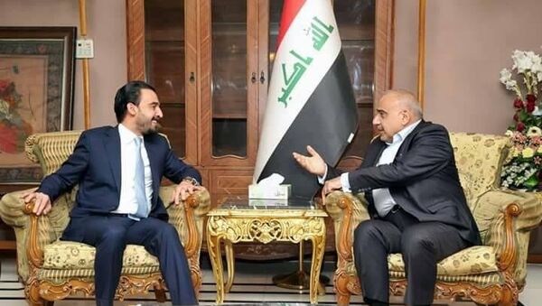 رئيس مجلس الوزراء العراقي المكلف، عادل عبد المهدي، أثناء لقائه مع رئيس بعثة الأمم المتحدة في العراق، يان كوبيتش، 8 أكتوبر/تشرين الأول 2018 - سبوتنيك عربي