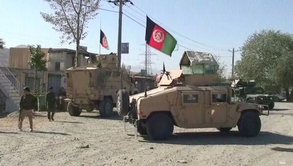 أفغانستان - سيارات همفي تقف بالقرب من موقع نفذت فيه طالبان هجوما إرهابيا - سبوتنيك عربي