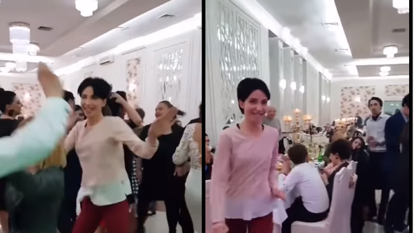 ردة فعل زوجة على رقص زوجها مع فتاة أخرى في حفل زفاف - سبوتنيك عربي