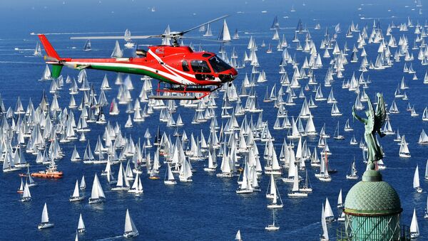 سباق برشلونة لسباق المراكب الشراعية الـ 50 ، بمشاركة 2700 مركب في خليج تريستي، إسبانيا 14 أكتوبر/ تشرين الأول 2018 - سبوتنيك عربي