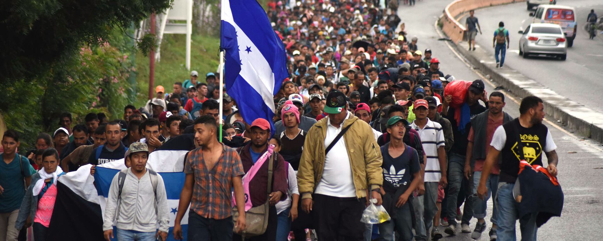قافلة من المهاجرين من هندوراس وغواتيمالا، يتجهون إلى حدود الولايات المتحدة الأمريكية  17 أكتوبر/ تشرين الأول 2018 - سبوتنيك عربي, 1920, 07.01.2022