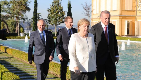 أردوغان و ميركل و بوتين و ماكرون خلال قمة تركيا حول سوريا - سبوتنيك عربي