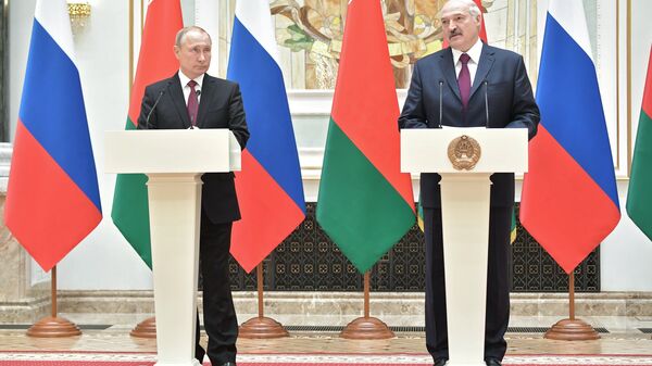 الرئيس البيلاروسي ألكسندر لوكاشينكو و الرئيس الروسي فلاديمير بوتين  - سبوتنيك عربي