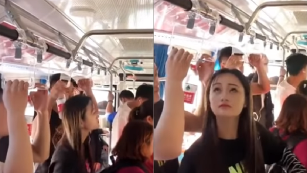 شاهد كيف تفادت فتاة صينية قصيرة مشكلتها في الباص - سبوتنيك عربي