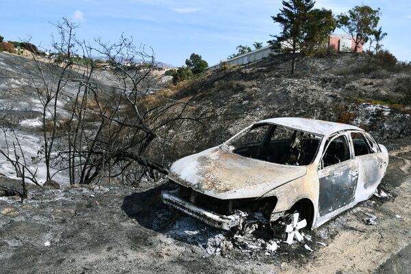 سيارة بعد الحريق في كاليفورنيا، نوفمبر/ تشرين الثاني 2018 - سبوتنيك عربي