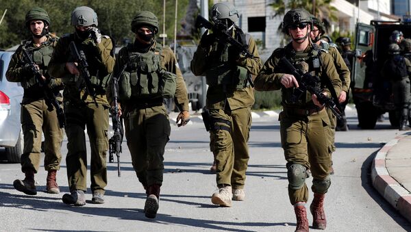 الجنود الإسرائيليون - اشتباكات مع الفلسطينيين في رام الله، الضفة الغربية 10 ديسمبر/ كانون الأول 2018 - سبوتنيك عربي