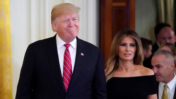 ميلانيا ترامب مع زوجها الرئيس الأمريكي دونالد ترامب - سبوتنيك عربي