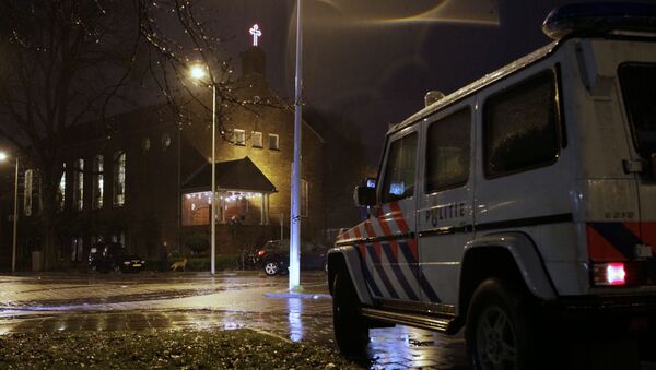 مركبة تابعة للشرطة تحرس الكنيسة القبطية، في أمستردام ، هولندا - سبوتنيك عربي