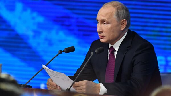 المؤتمر الصحفي السنوي للرئيس الروسي فلاديمير بوتين في موسكو، 220 ديسمبر/ كانون الأول 2018 - سبوتنيك عربي