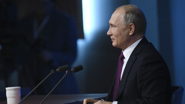 المؤتمر الصحفي السنوي للرئيس الروسي فلاديمير بوتين في موسكو، 20 ديسمبر/ كانون الأول 2018 - سبوتنيك عربي