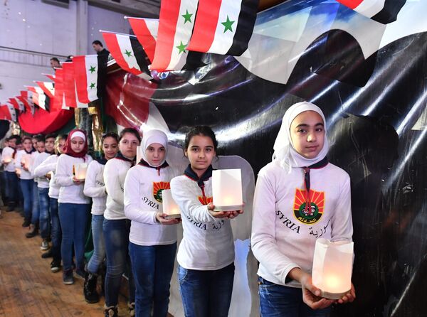 المشاركات في الاحتفال بالذكرى الثانية لتحرير حلب من المسلحين - سبوتنيك عربي