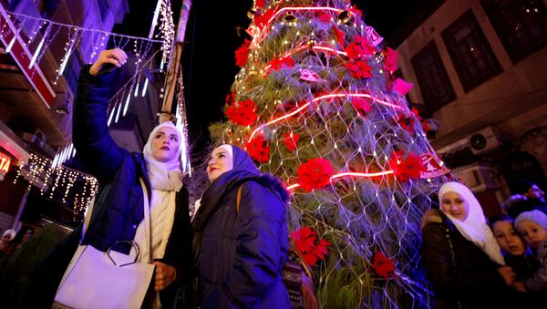سكان دمشق يحتفلون بعيد الميلاد - سبوتنيك عربي