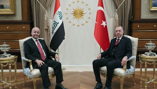 الرئيس التركي رجب يب أردوغان، مع الرئيس العراقي برهم صالح خلال زيارته الأخير إلى أنقرة - سبوتنيك عربي