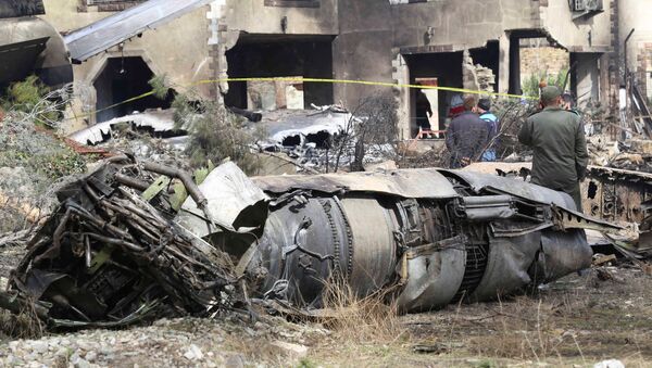 تحطم الطائرة الإيرانية بوينغ 707 في محافظة ألبرز، في منطقة سكنية بضواحي طهران، إيران 14 يناير/ كانون الثاني 2019 - سبوتنيك عربي