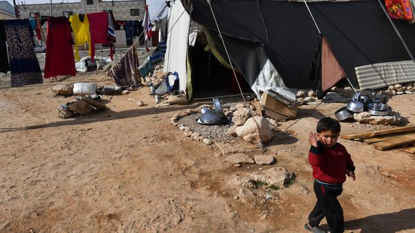مخيم اللاجئين، النازحين السوريين من تدمر، في ريف حمص، سوريا - سبوتنيك عربي