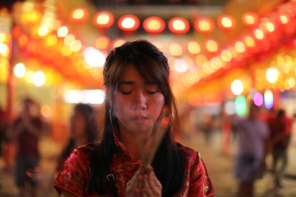 الاحتفال برأس السنة القمرية الصينية الجديدة في معبد في بانكوك، تايلاند 4 فبراير/ شباط 2019 - سبوتنيك عربي