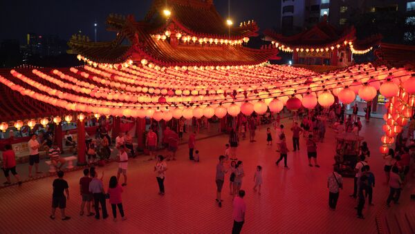  الاحتفال برأس السنة القمرية الصينية الجديدة في معبد في كوالالمبور، ماليزيا 4 فبراير/ شباط 2019 - سبوتنيك عربي