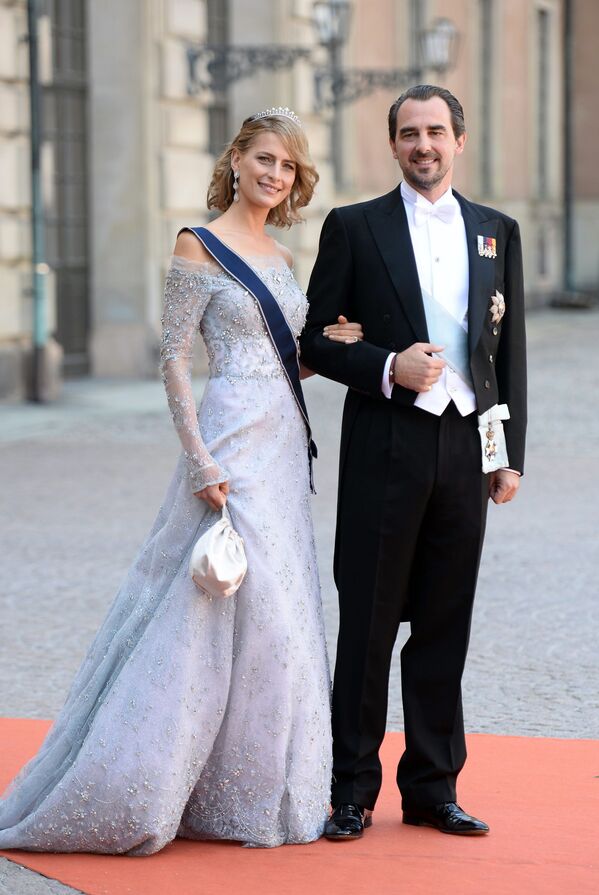 الأميرة تاتيانا، أميرة اليونان، والأمير نيكولاس، أمير اليونان، يحضران حفل زفاف أمير السويد كارل فيليب وضوفيا هيلكفيست في القلعة الملكية في قصر ستوكهولم، 13 يونيو/ حزيران 2015 - سبوتنيك عربي