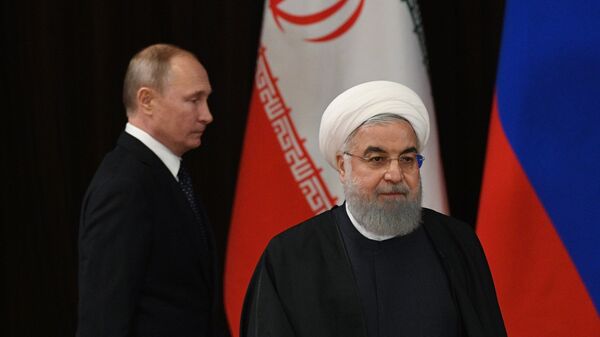 الرئيس الروسي فلاديمير بوتين ونظيره والإيراني حسن روحاني في لقاء سوتشي، روسيا 14 فبراير/ شباط 2019 - سبوتنيك عربي