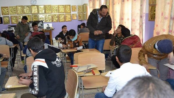 رسول للرسم يُحقق معجزة في مدرسة عراقية - سبوتنيك عربي