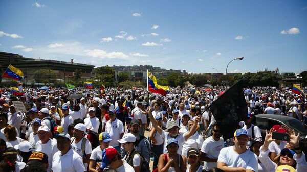 مظاهرات المعارضة الفنزويلية (خوان غوايدو) في كاراكاس، فنزويلا فبراير/ شباط 2019  - سبوتنيك عربي