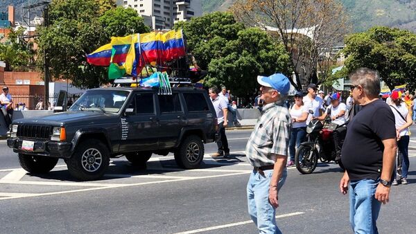 مظاهرات المعارضة الفنزويلية (خوان غوايدو) في كاراكاس، فنزويلا فبراير/ شباط 2019 - سبوتنيك عربي