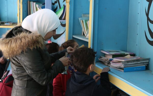 دمشق التبادلية: ضع كتاب وخذ آخر...100 ألف كتاب في أضخم مكتبة مدرسية عربية - سبوتنيك عربي
