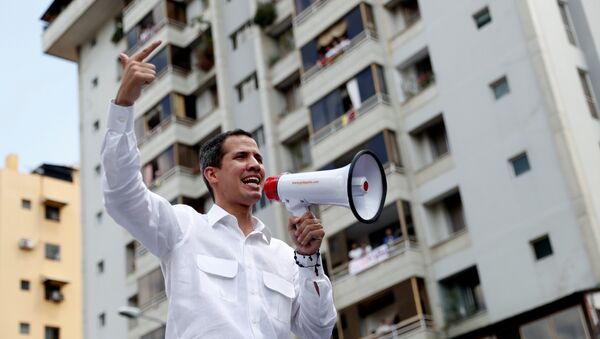 زعيم المعارضة الفنزويلية خوان غوايدو يشارك في مظاهرة حاشد ضد مادورو - سبوتنيك عربي