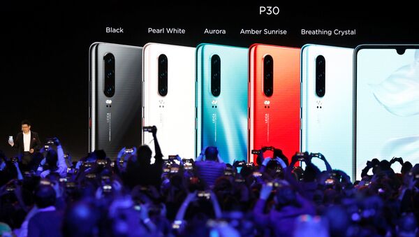 شركة هواوي الصينية تطلق هاتفي بي 30 وبي 30 برو في العاصمة الفرنسية باريس/ 26 مارس/آذار 2019 - سبوتنيك عربي