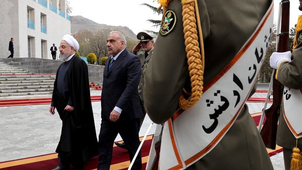 رئيس الحكومة العراقية، عادل عبد المهدي مع الرئيس الإيراني حسن روحاني - سبوتنيك عربي