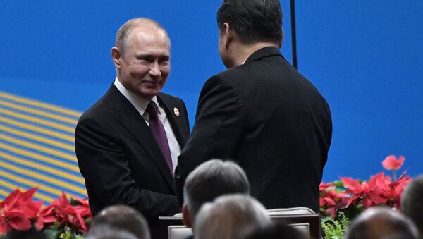 الرئيس الروسي فلاديمير بوتين والرئيس الصيني شي جين بينغ - سبوتنيك عربي