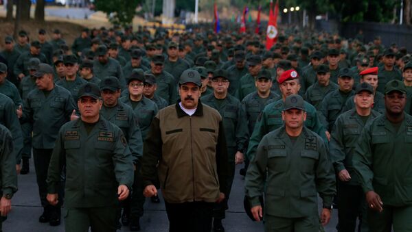 الرئيس الفنزويلي نيكولاس مادورو مع قادة الجيش - سبوتنيك عربي